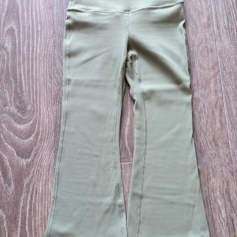 Athleta Elation Ribbed Green Leggings with Flared Design